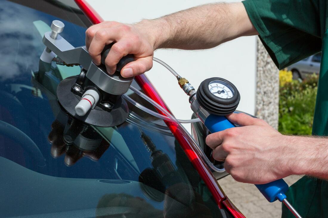 this image shows windshield chip repair in Lafayette, Louisiana